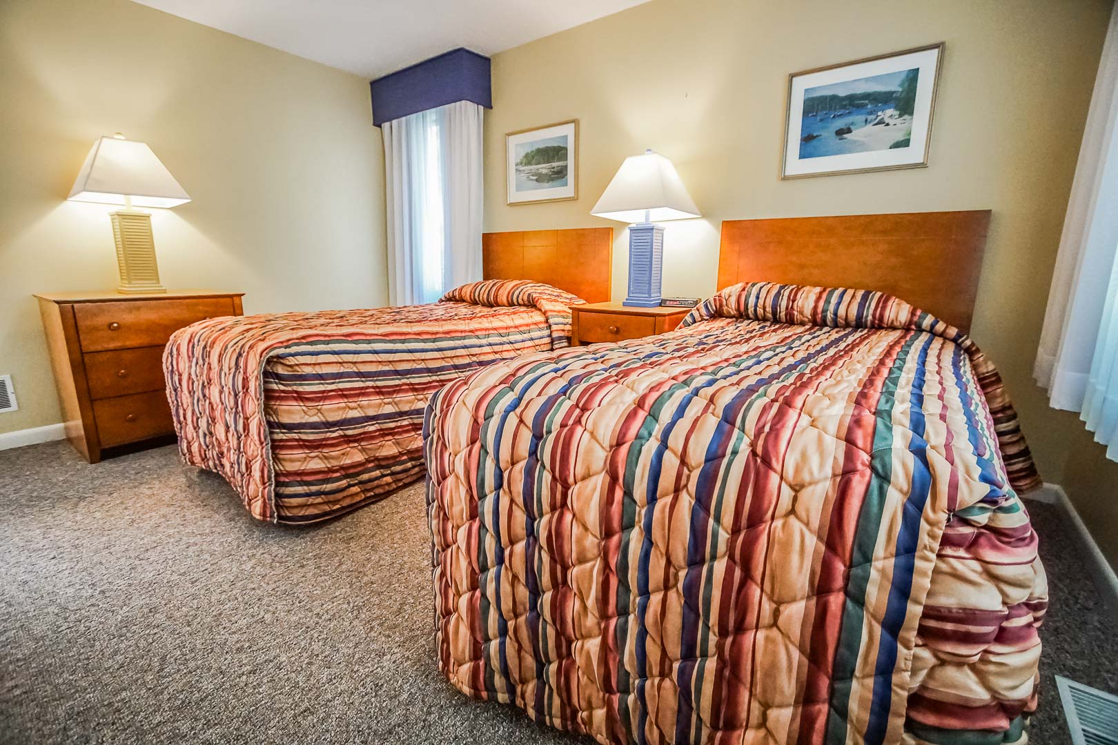 A two bedroom unit with double beds available at VRI's Cape Cod Holiday Estates in Massachusetts.